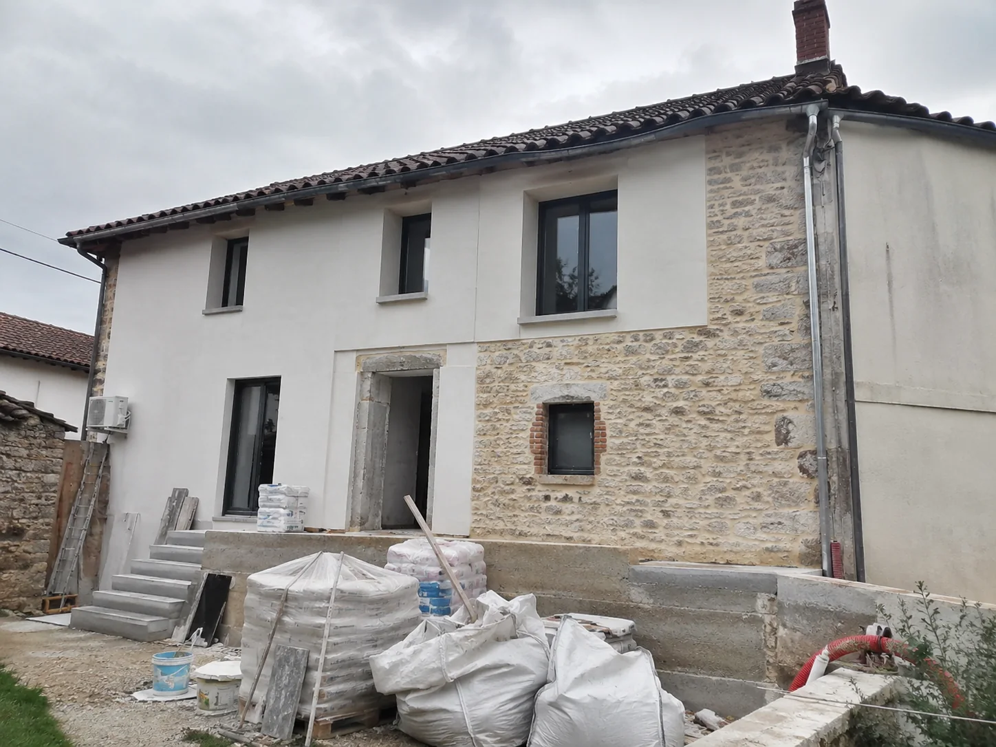 Property exterior during renovation