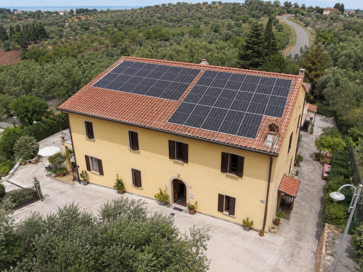 Property with upgraded roof and photovoltaic system